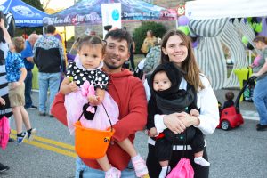 Family at Town of Hudson Trick or Treat 2024